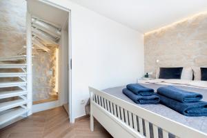 Llit o llits en una habitació de Casa Bellavista Sea View