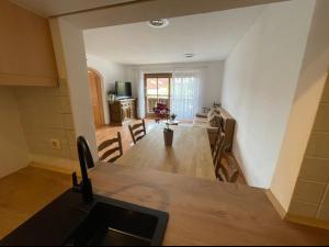 a view of a kitchen and a living room at Ferienwohnung Wolf in Seebruck