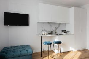 Kuchyň nebo kuchyňský kout v ubytování WILLA MAGNOLIA - Apartamenty i Pokoje - ROWERY, POKÓJ ZABAW, KAWA Z EKSPRESU