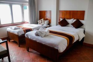 Letto o letti in una camera di Hotel ThorongLa Thamel