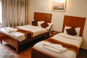 Letto o letti in una camera di Hotel ThorongLa Thamel