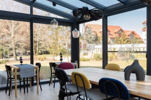 Fotografie z fotogalerie ubytování WILLA MAGNOLIA - Apartamenty i Pokoje - ROWERY, POKÓJ ZABAW, KAWA Z EKSPRESU v destinaci Jantar