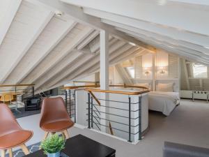 Posezení v ubytování L'Hôtel by Hostellerie du Château