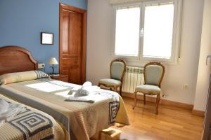 Postel nebo postele na pokoji v ubytování CASA RAICHU