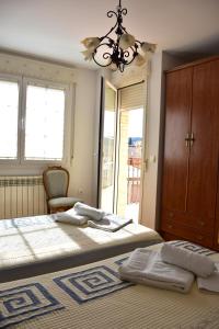 Postel nebo postele na pokoji v ubytování CASA RAICHU