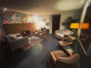 Posezení v ubytování B&B L'Echappée Belle Welness Spa et Table d'hôtes