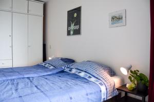Postel nebo postele na pokoji v ubytování Ameleven