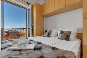Postel nebo postele na pokoji v ubytování Apartments Danica Drašnice