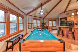 a pool table in the middle of a room at Gatlinburg Smoky Mountain Cabin Amazing Views in Gatlinburg