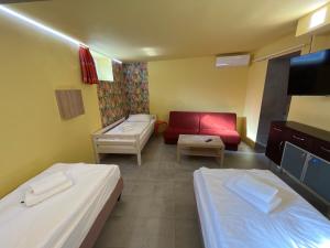 Postel nebo postele na pokoji v ubytování Apartmány LETO