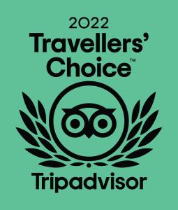 a logo for the travelers choice triadvisor at St. Hilary Guest House in Llandudno