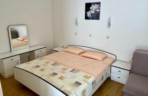 Postel nebo postele na pokoji v ubytování Apartments Villa Emilija