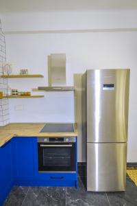 A kitchen or kitchenette at Gorgeous Apartment in the city center