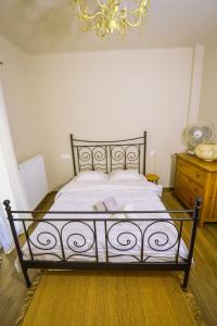 A bed or beds in a room at Gorgeous Apartment in the city center