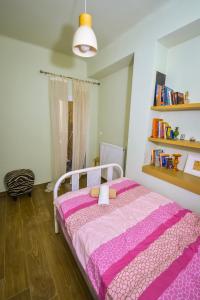 A bed or beds in a room at Gorgeous Apartment in the city center