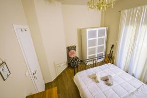 A bed or beds in a room at Gorgeous Apartment in the city center