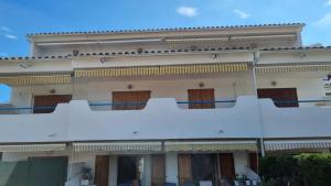 Balkón nebo terasa v ubytování Apartamento familiar con piscina y wifi