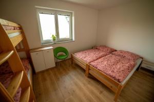 Postel nebo postele na pokoji v ubytování Ubytování Horní Slověnice