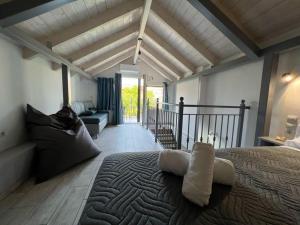 a bedroom with a large bed in a room at Villa Perivoli in Parga