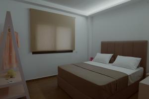 A bed or beds in a room at Villa Etoile