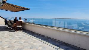 En balkon eller terrasse på Magic Sea View