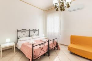 A bed or beds in a room at Paco House