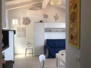 A kitchen or kitchenette at La dolce vita , fronte mare