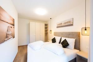 Posteľ alebo postele v izbe v ubytovaní CityPointapartments-Park