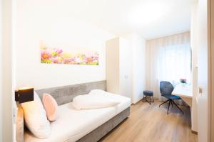 Posteľ alebo postele v izbe v ubytovaní CityPointapartments-Park