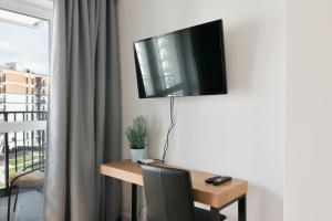 Telewizja i/lub zestaw kina domowego w obiekcie Rakowska Home Double Parking - miejsce dla 2 aut w cenie- double parking spot included