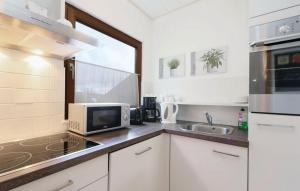 Küche/Küchenzeile in der Unterkunft Ferienhaus bei Zoe mit Sauna
