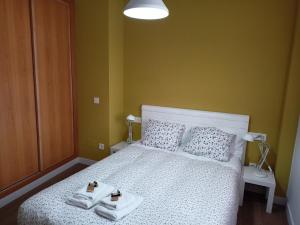 Katil atau katil-katil dalam bilik di Apartamentos PuntoApart Málaga