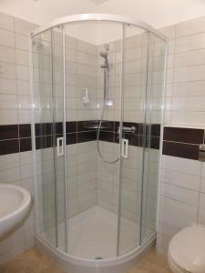 Kúpeľňa v ubytovaní Sástó Hotel