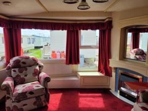 Posezení v ubytování 6 Berth Seaview Ingoldmells Park Lodge