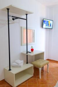 TV a/nebo společenská místnost v ubytování Hotel Piccolino