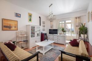 TV/trung tâm giải trí tại Terra Beach Apartment