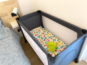 A bed or beds in a room at Appartamento Katia