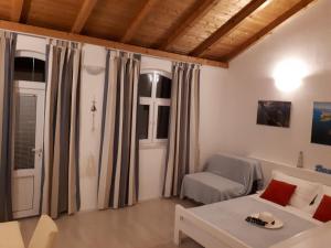 a living room with a couch and a table at Apartment Gogi in Vodice