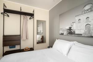 Postel nebo postele na pokoji v ubytování Attico 37 - Comfort room con terrazza privata