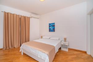 Postel nebo postele na pokoji v ubytování Alex Lux sea view apartment 1