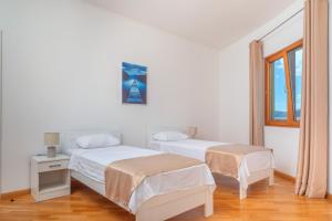 Postel nebo postele na pokoji v ubytování Alex Lux sea view apartment 1