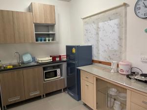Η κουζίνα ή μικρή κουζίνα στο M Villa @ Impact Muangthongthani