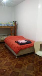 מיטה או מיטות קומותיים בחדר ב-Hospedaje Del Pilar en Magdalena del Mar