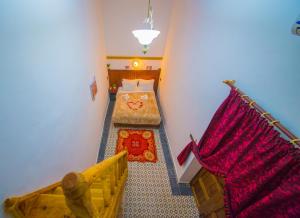 Postel nebo postele na pokoji v ubytování Riad Fes Basma