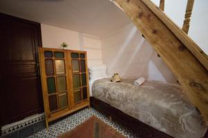 Postel nebo postele na pokoji v ubytování Riad Fes Basma