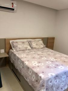 Ένα ή περισσότερα κρεβάτια σε δωμάτιο στο Flat Encantador na Praia dos Carneiros