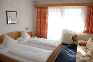 Postel nebo postele na pokoji v ubytování Hotel Edelweiss
