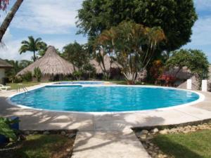Bazén v ubytování Hotel Maribu Caribe nebo v jeho okolí
