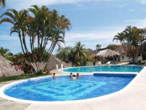 Bazén v ubytování Hotel Maribu Caribe nebo v jeho okolí