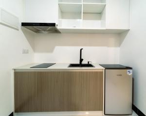 Kuchyň nebo kuchyňský kout v ubytování LH Residence 752